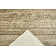 Holzstruktur mit einer Ecke eines Papierbogens