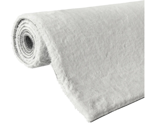 Aufgerollter, heller Teppich
