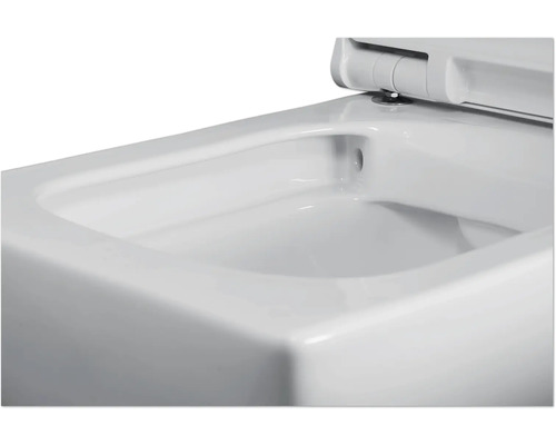 Nahaufnahme einer weißen Toilette mit Deckel