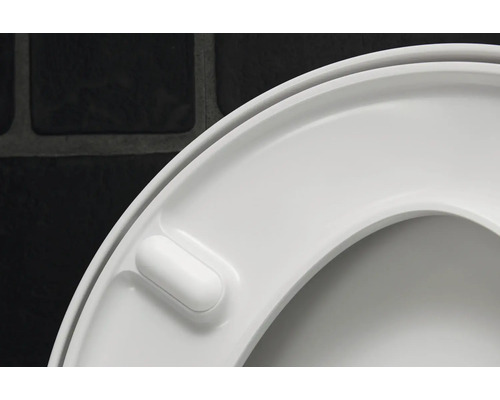 Weißer Toilettensitz aus Kunststoff