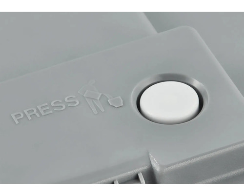 Druckknopf mit Symbol und der Aufschrift ''Pressen''.