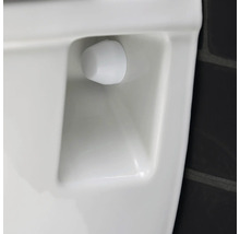 Detailaufnahme eines Urinals mit passendem Siphon