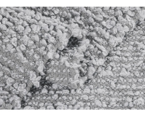 Nahaufnahme eines grauen Teppichs mit Schlingenstruktur