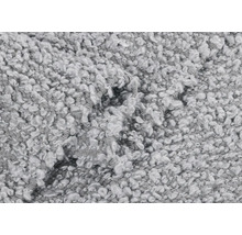 Detailaufnahme eines Teppichs mit Schlingenstruktur