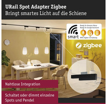 URail Spot Adapter Zigbee in einem Esszimmer mit Pendelleuchten über einem Esstisch.