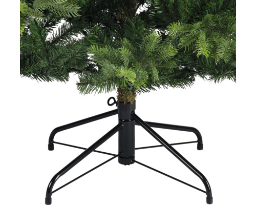 Detailansicht eines künstlichen Weihnachtsbaums mit schwarzem Metallständer.