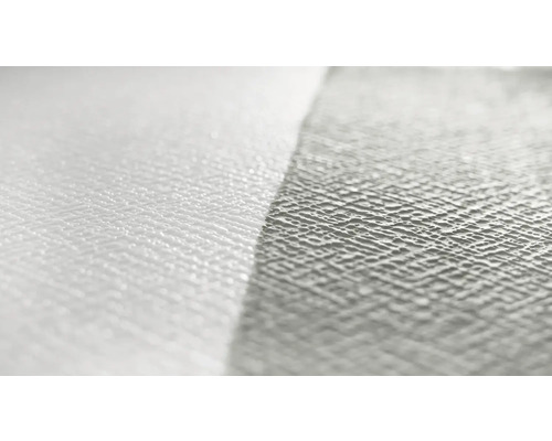 Nahaufnahme einer weißen Vliestapete mit Struktur