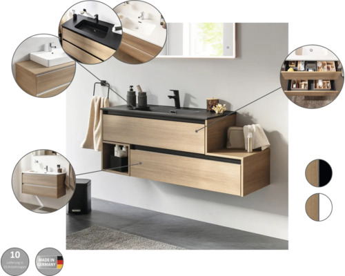 Modernes Badezimmer mit Waschtischunterschrank in Holzoptik und schwarzer Arbeitsplatte
