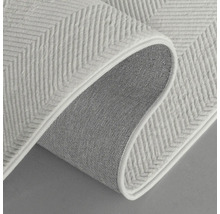 Detailansicht eines Teppichs mit Zickzackmuster