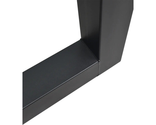 Detailaufnahme einer schwarzen Tischkufe aus Metall mit quadratischem Profil und Schweißnaht.