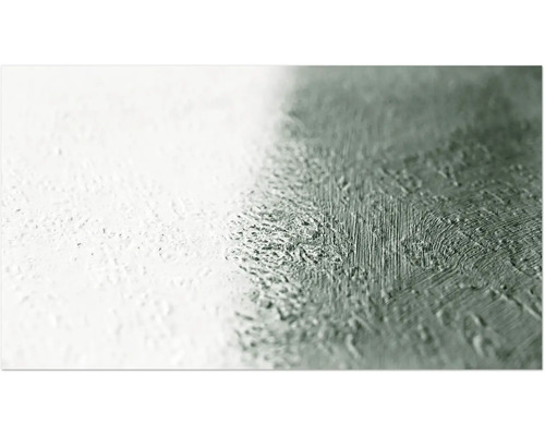 Nahaufnahme einer Wand mit Farbauftrag