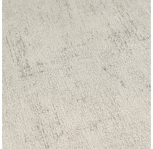 Nahaufnahme einer hellen, strukturierten Tapete mit feinen Mustern