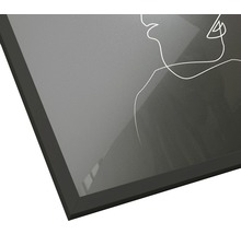 Gerahmtes Bild mit Strichzeichnung einer Frau