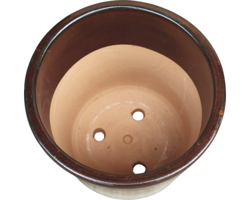 Innenansicht eines Blumentopfs mit Drainagelöchern