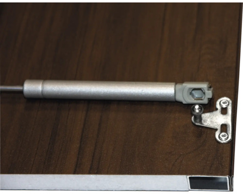 Möbel-Gasdruckfeder auf einer Holzoberfläche