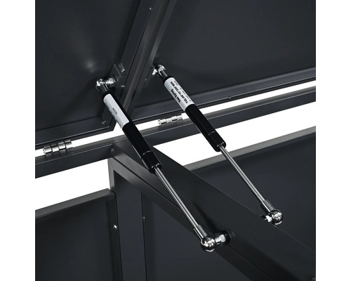 Detailansicht von Gasdruckfedern an einer Aufbewahrungsbox