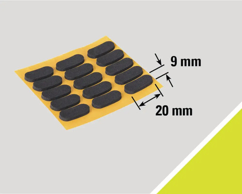 Selbstklebende Möbelgleiter mit den Massen neun mal zwanzig Millimeter auf einem Trägerbogen.