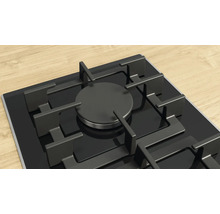 Gaskochfeld mit schwarzer Glasoberfläche und einer Kochstelle