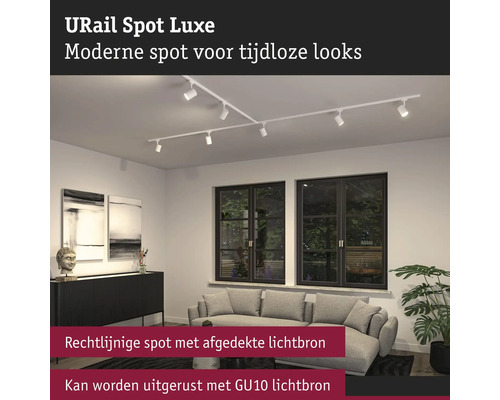 URail Spot Luxe Schienensystem mit mehreren Strahlern in einem Wohnzimmer.
