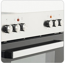 Nahaufnahme eines Küchenherds mit Bedienknöpfen