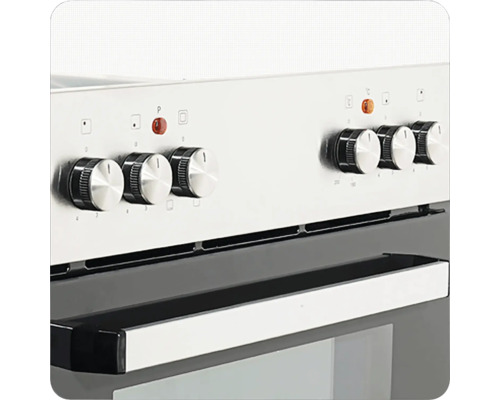 Detailansicht eines Herds mit Bedienknebeln und Griff