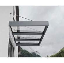 Modernes Vordach aus Glas mit anthrazitfarbenem Aluminiumrahmen, montiert an einer Hauswand mit Zugstangen.