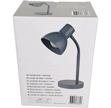 Verpackung einer grauen Schreibtischlampe