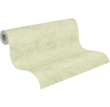 Vliestapete in Beige mit Betonoptik und strukturierter Oberfläche auf einer Rolle.