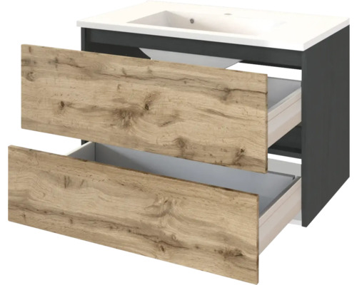 Waschtischunterschrank mit weißem Waschbecken und zwei geöffneten Schubladen mit Fronten in Holzoptik und anthrazitfarbenem Korpus.
