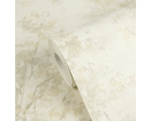 Strukturierte Vliestapete mit abstraktem Metallic-Muster in Creme und Beige.