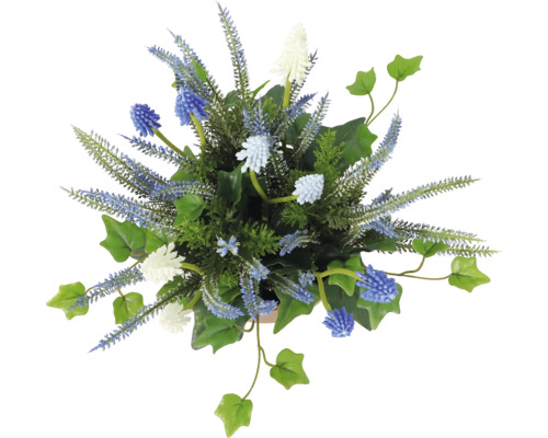 Blumenarrangement mit verschiedenen künstlichen Blumen und Blättern