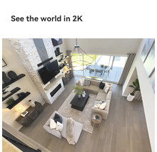 Ansicht eines Wohnzimmers mit modularem Sofa, Kaffeetisch und Fernseher
