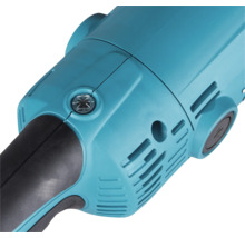 Nahaufnahme eines Elektrowerkzeug-Gehäuses mit Lüftungsschlitzen und Schraubkappe für den Kohlebürstenwechsel.