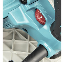 Detailansicht eines türkisfarbenen Makita Elektrowerkzeugs mit einem roten Einstellrad für die Geschwindigkeit und nummerierter Skala.