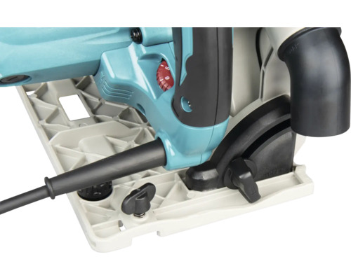 Detailansicht einer türkisfarbenen Tauchsäge mit Grundplatte, schwarzen Einstellknöpfen, rotem Drehzahleinstellrad und Absaugstutzen.