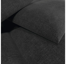 Detailansicht eines Polstermöbelstücks mit gewebter Stoffoberfläche.