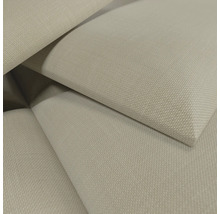 Nahaufnahme eines beigen, gewebten Stoffes mit strukturierter Oberfläche.