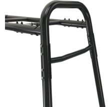 Detailansicht eines schwarzen Metallgestells für Regalsysteme mit Rohrrahmen und sichtbaren Verschraubungen.