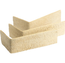 Beige Eck-Verblender aus Leichtbeton mit rauer Oberfläche in Natursteinoptik.