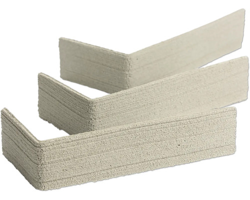 Verblender-Eckstücke aus Leichtbeton mit strukturierter Oberfläche.
