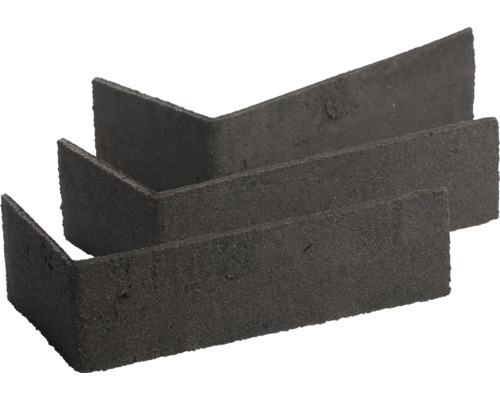 Anthrazitfarbene Eckriemchen in L-Form aus strukturiertem Material für die Wandverkleidung.