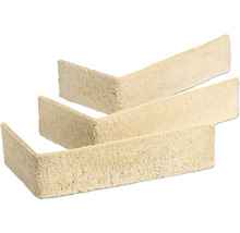 Drei beige, winkelförmige Verblendsteine mit strukturierter Oberfläche.