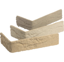 Beige Verblendsteine Eckstücke in L-Form mit strukturierter Natursteinoptik.