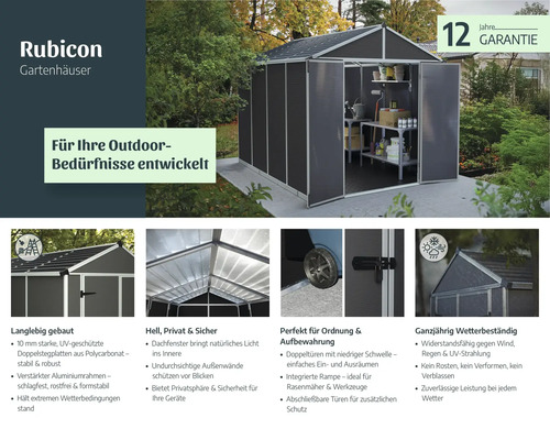 Dunkelgraues Rubicon Gartenhaus aus Polycarbonat mit Aluminiumrahmen, Doppeltüren, lichtdurchlässigem Dach und Inneneinrichtung im Garten.
