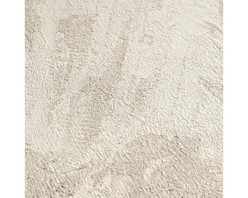 Strukturierte Vliestapete in Putzoptik in Beige.