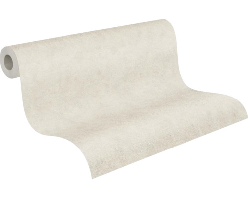 Leicht strukturierte Tapetenrolle in hellem Beige mit Putzoptik.
