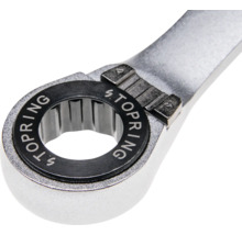 Nahaufnahme eines Ring-Ratschenschlüssels aus Metall mit Stopring-Schriftzug und Umschalter für die Drehrichtung.