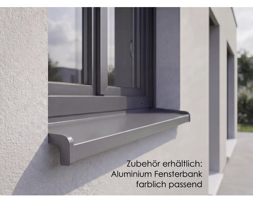 Dunkelgraue Aluminium Außenfensterbank montiert an einer Hausfassade unter einem Fenster.