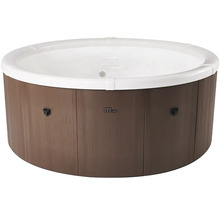 Runder Whirlpool von MSpa mit Paneelen in Holzoptik und weißer Innenverkleidung.
