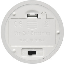 Unterseite eines Elektrogeräts mit Batteriefach für zwei AA-Batterien sowie Schalter für Ein, Aus und Timer.